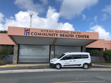 Image of the shuttered front entrance to the MKS Community Health Center closed by the hurricane.